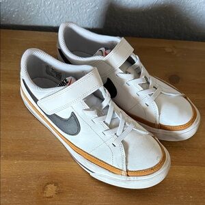 Nike Kids White and Black Sneakers with Orange Accents